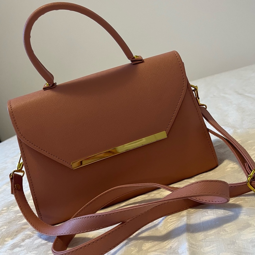 Perfect condition sturdy fake leather pink purse.